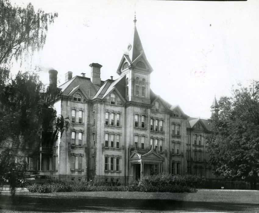 【Asylum】 About — The Village at Grand Traverse Commons